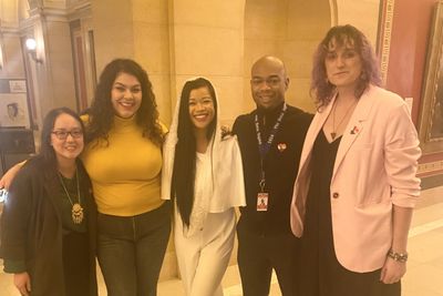 Thuba in a group selfie at the Capital Rotunda with colleagues at the state legislature.